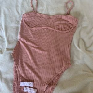 Brand new corset type body suit